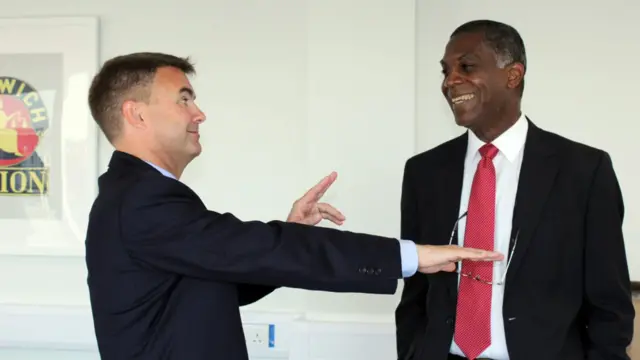 Michael Holding (right)