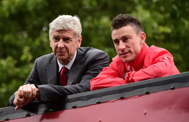 Arsene Wenger and Laurent Koscielny