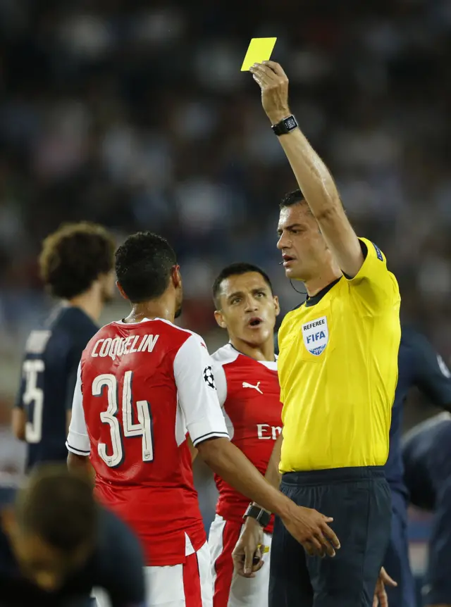 Francis Coquelin receives a yellow card