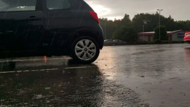 Flooding on car park in Festival Park, Etruria