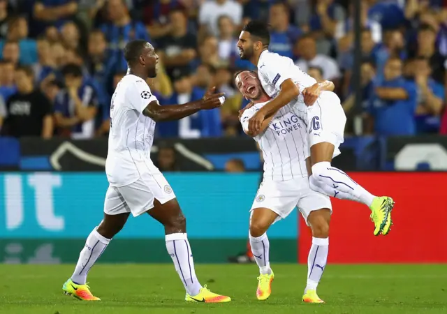 Leicester players celebrate their second goal