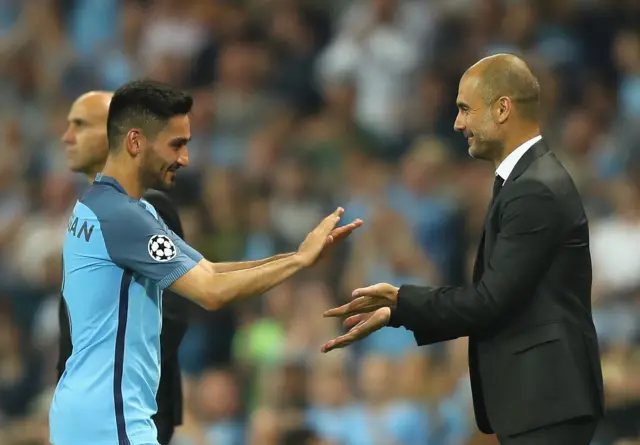 Ilkay Gundogan and Pep Guadiola