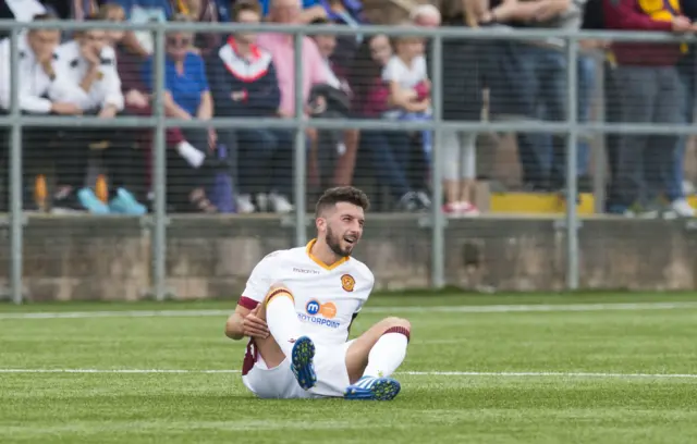 Lee Lucas lies injured during his Motherwell debut against Annan Athletic