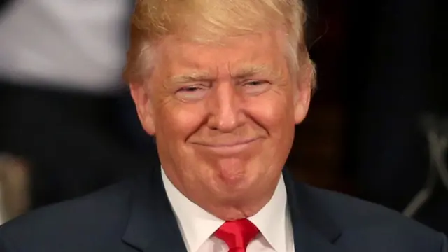 Republican presidential candidate Donald Trump smiles after speaking at a lunch for the Economic Club of New York in New York, Thursday, Sept. 15, 2016