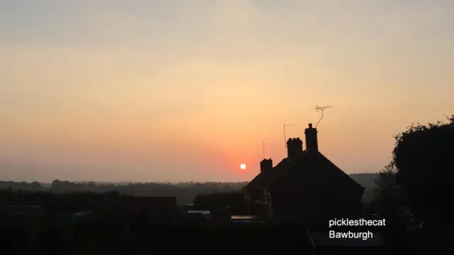 Sunrise over houses