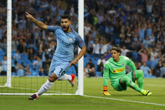 Sergio Aguero celebrates scoring for Manchester City against Borussia Monchengladbach