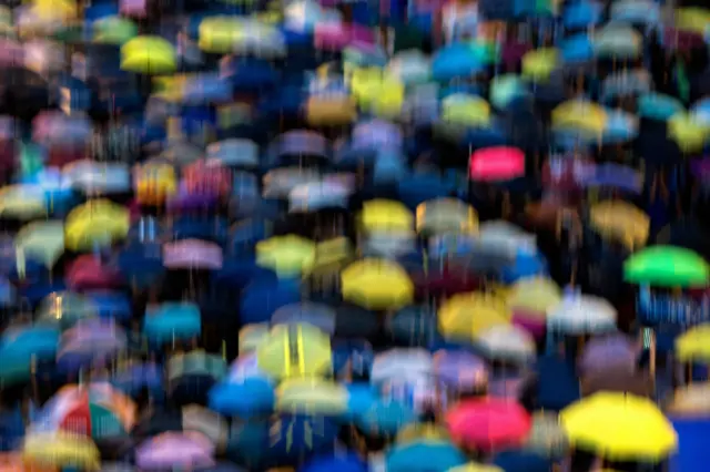 Umbrellas in the heavy rain