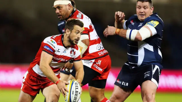 Greig Laidlaw looks to play the ball for Gloucester