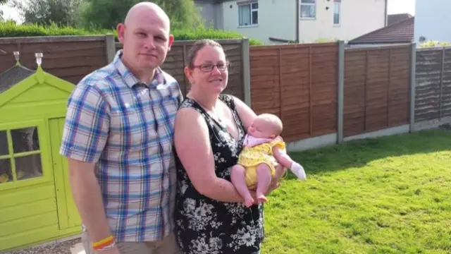 Russ and Kerry Fisher with eight-week-old Sofie