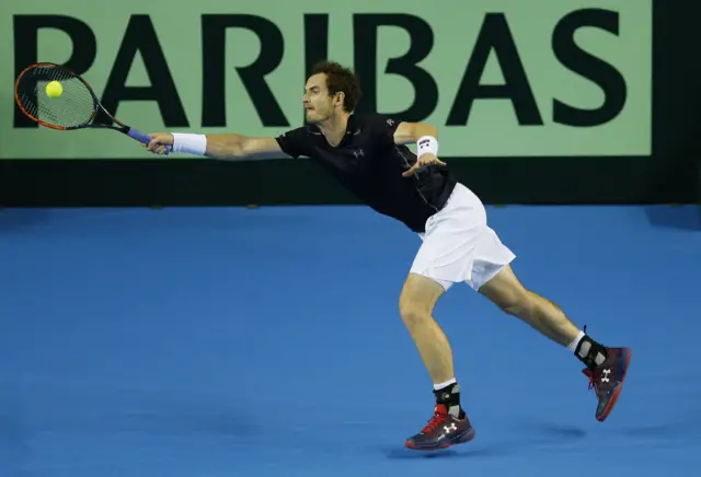 Murray saves set point