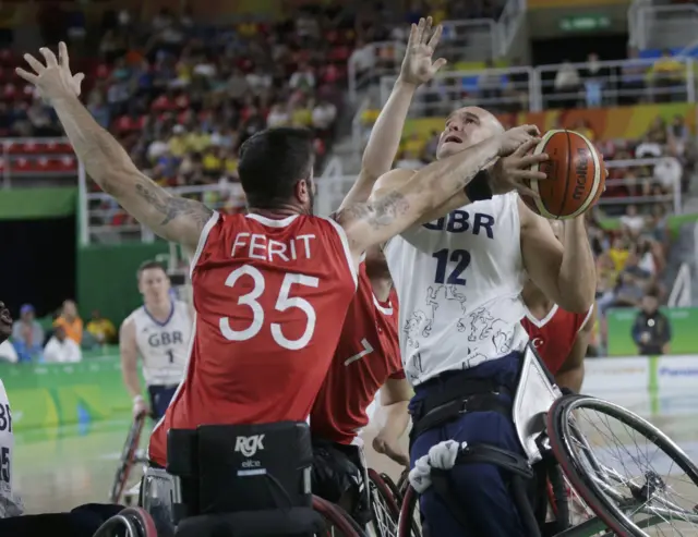 Ian Sagar of Britain and Ferit Gumus of Turkey in action