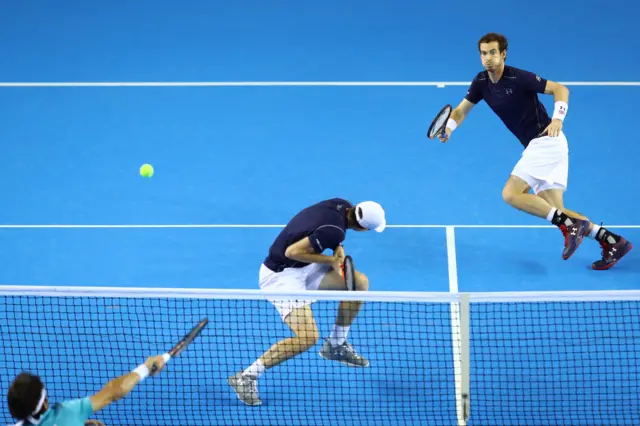 Andy Murray chases down the ball