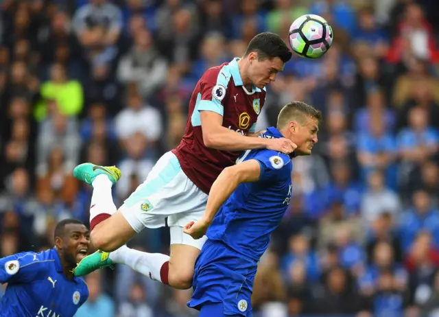 Michael Keane fouls Robert Huth