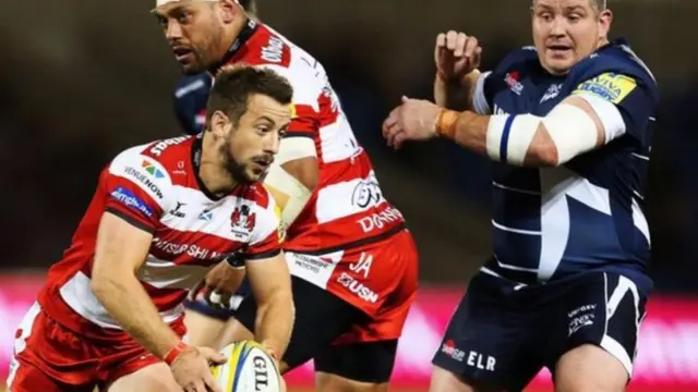 Greig Laidlaw plays the ball for Gloucester against Sale