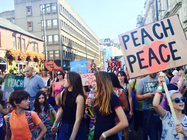 people with placards