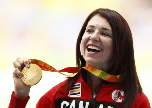 Canada's Michelle Stilwell celebrates her gold in the T52 100m