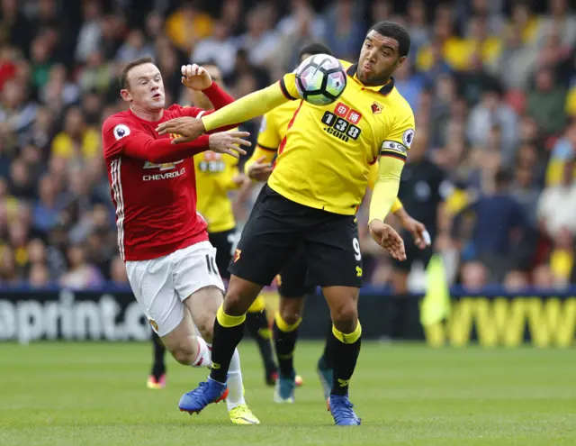 Troy Deeney moves away from Wayne Rooney