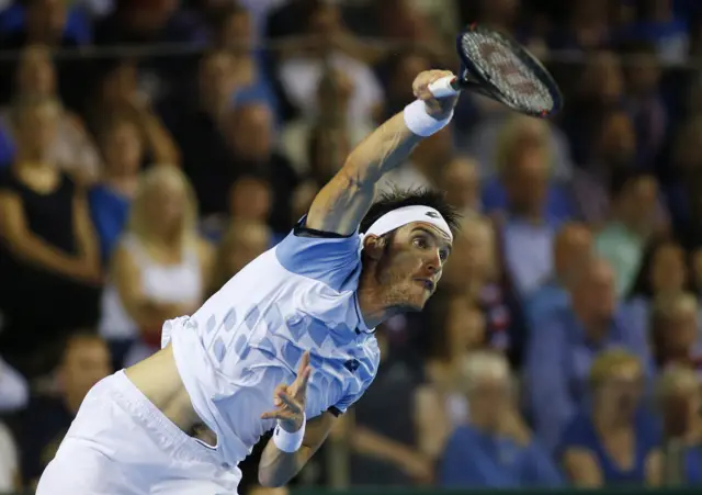 Leonardo Mayer serves