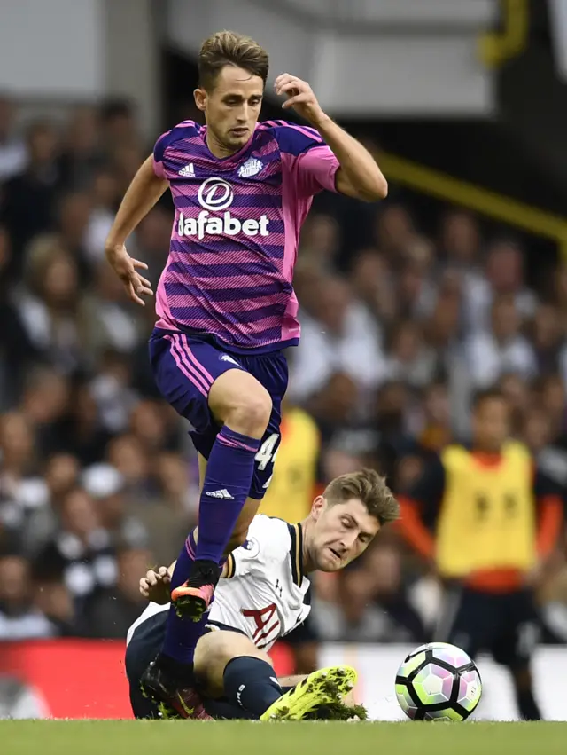 Adnan Januzaj is challenged by Ben Davies