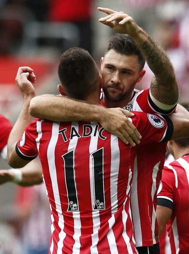 Charlie Austin celebrates