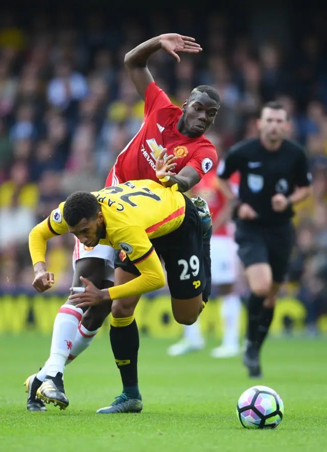 Paul Pogba fouls Etienne Capoue