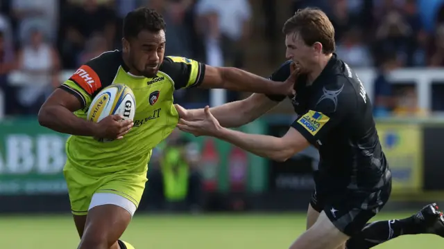 Telusa Veainu of Leicester is tackled by Simon Hammersley