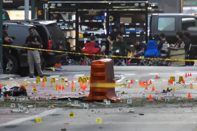 Evidence markers set out near the site of the explosion in the Chelsea neighborhood of Manhattan