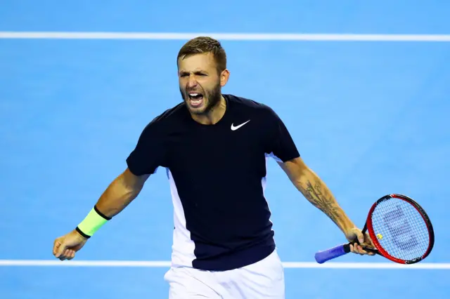 Dan Evans celebrates