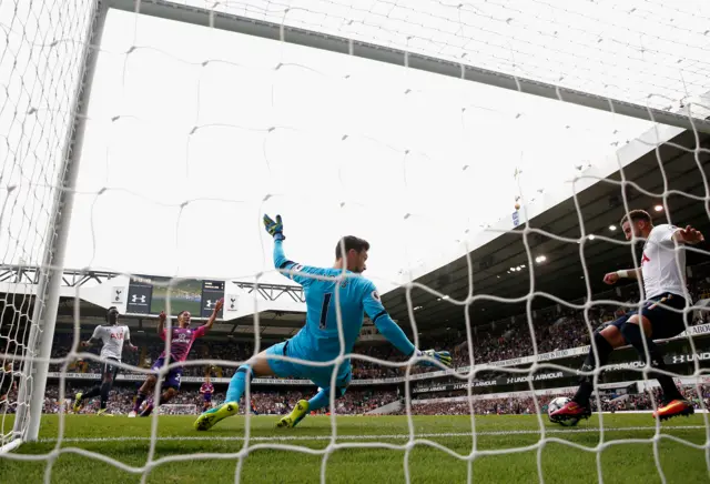 Pienaar's shot cleared off the line by Kyle Walker