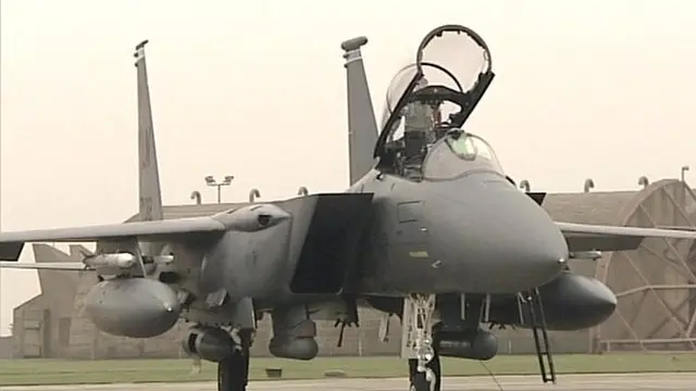 F-15 jet at Lakenheath - on the runway with hangar behind