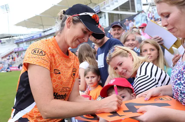 Charlotte Edwards signs autographs