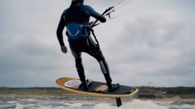 Merijn Tinga on surfboard