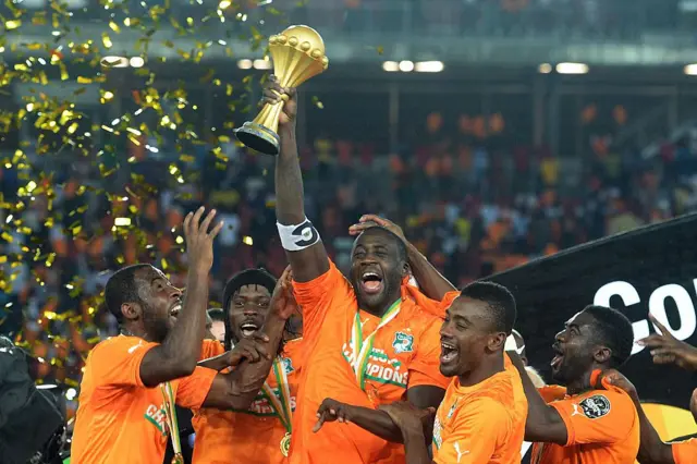 Toure lifting the trophy in 2015