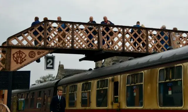 People on a footbridge