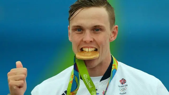 Joe Clarke with Olympic medal