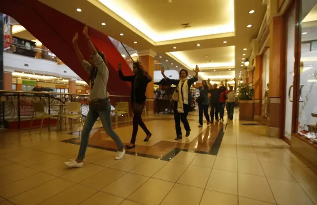 People during the Westgate mall siege in Nairobi, Kenya - 2013