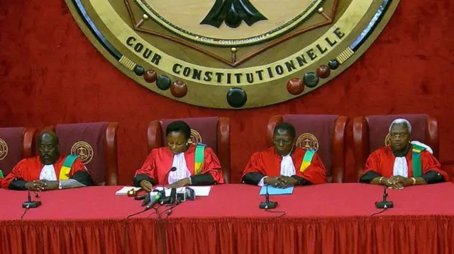 constitutional court judges sit in session