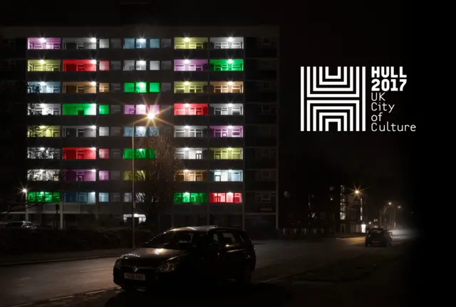 Illuminated block of flats