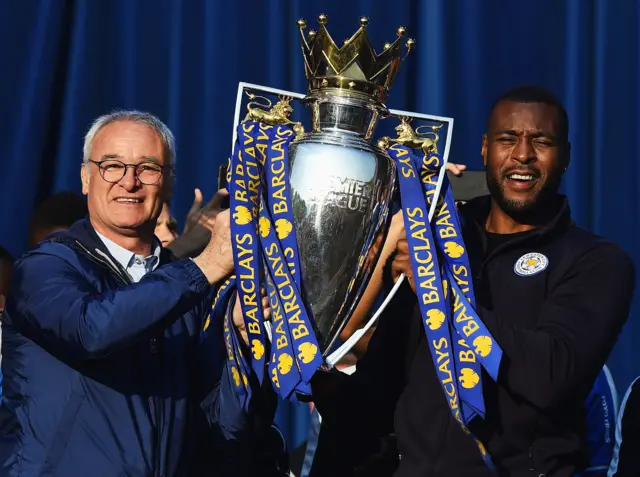 Claudio Ranieri and Wes Morgan lift the Premier League trophy