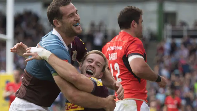 Harlequins' Charlie Waker celebrates his try with Tim Visser