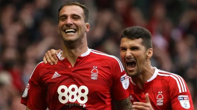 Nottingham Forest's Apostolos Velios and Eric Lichaj celebrate scoring against Norwich City