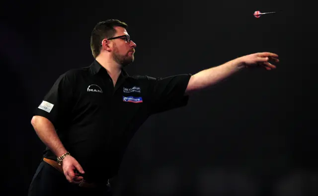 James Wade throws a dart