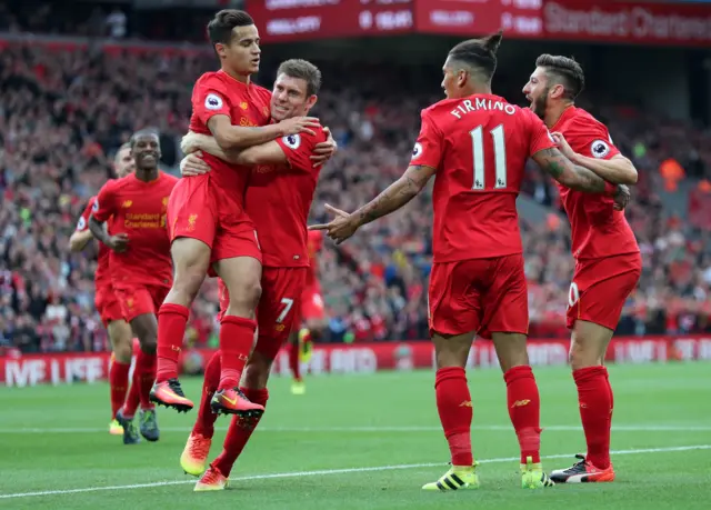 James Milner celebrates