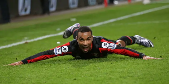 Junior Stanislas celebrates scoring against Everton