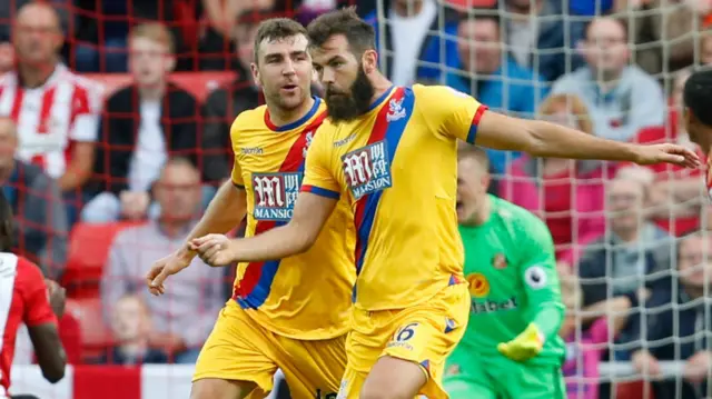 Joe Ledley celebrates