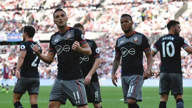 Dusan Tadic celebrates