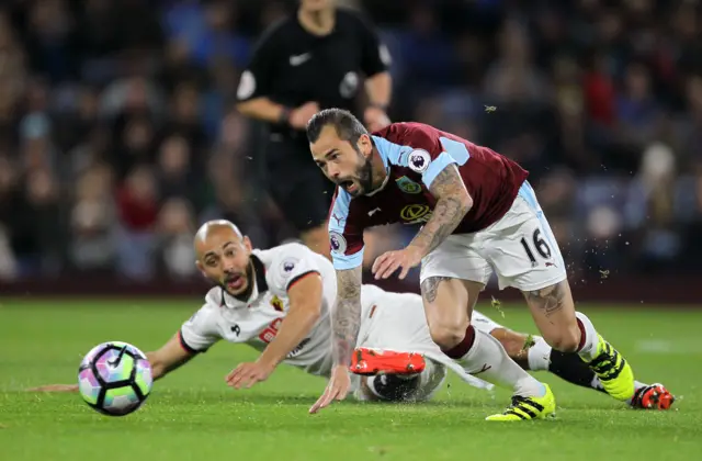 Steven Defour (right) and Watford"s Nordin Amrabat battle for the ball