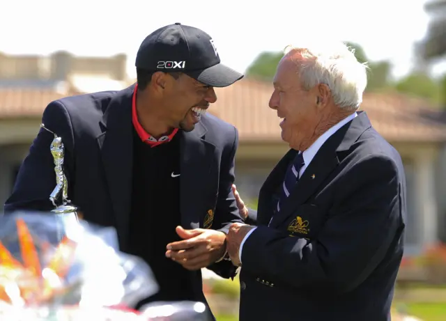 Tiger Woods and Arnold Palmer