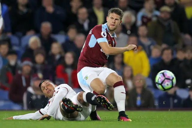 Burnley"s Johann Berg Gudmundsson (right) and Watford"s Jose Holebas battle for the ball