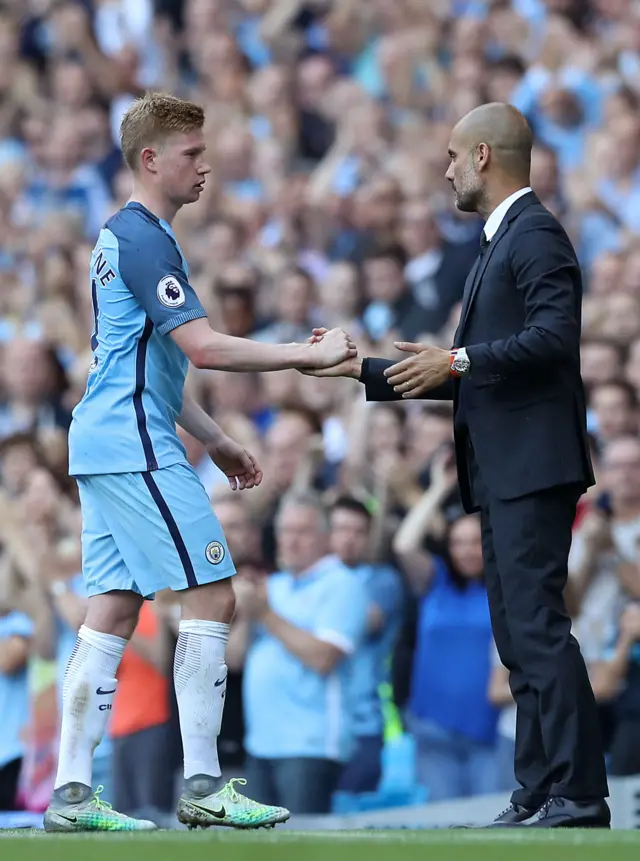 Kevin de Bruyne and Manchester City manager Pep Guardiola